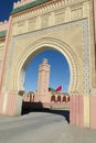 Arabic style gate and mosque minaret Royalty Free Stock Photo