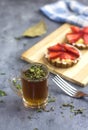 arabic tea on glass teacup with delicious strawberry tart.