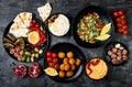 Arabic traditional cuisine. Middle Eastern meze platter with pita, olives, hummus, stuffed dolma, labneh cheese balls, falafel.