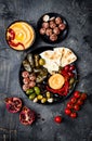 Arabic traditional cuisine. Middle Eastern meze platter with pita, olives, hummus, stuffed dolma, labneh cheese balls in spices. Royalty Free Stock Photo