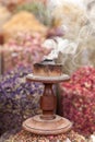 Arabic traditional incense bukhoor agar wood burner in with smoke, Ramadan and Eid occasions