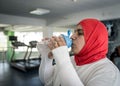 Arabic woman active working out in gym