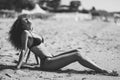 Arabic woman with beautiful body in bikini lying on the beach sa Royalty Free Stock Photo