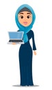 Arabic woman holding laptop.