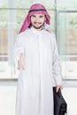 Arabic worker offers handshake in office Royalty Free Stock Photo