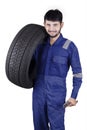 Arabic workshop worker with a tire