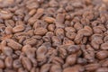 Roasted coffee beans as a background. Macro photo of coffee. Arabica medium roast