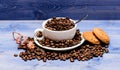 Arabica robusta coffee variety. Beverage for inspiration and energy charge. Cup full coffee brown roasted bean blue Royalty Free Stock Photo