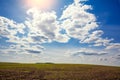 Arable field with a beautiful cloudy sky Royalty Free Stock Photo