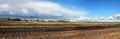 Arable fields in sunny autumn day with clouds Royalty Free Stock Photo