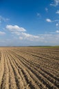 Arable land against the background of an autumn landscape Royalty Free Stock Photo