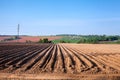 Arable land in the lowlands. Agricultural work. Royalty Free Stock Photo