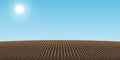 Arable land background with sky and sun