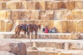Arabs in the shade of famous and the great pyramids