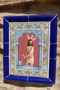 Tiles with a Christ in Aracena, Huelva. spain