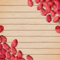 Arachis or peanuts background with red scattered nuts and beans