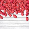 Arachis or peanuts background with red scattered nuts and beans