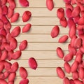 Arachis or peanuts background with red scattered nuts and beans