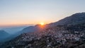 Arachova Greece mountain town aerial drone view. Traditional houses at sunset Royalty Free Stock Photo