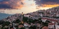 Arachova Greece mountain town aerial drone view. Traditional houses at sunset Royalty Free Stock Photo