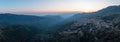 Arachova Greece mountain town aerial panorama. Traditional houses at sunset Royalty Free Stock Photo