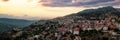 Arachova Greece mountain town aerial panorama. Traditional houses at sunset Royalty Free Stock Photo