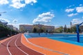 Arad,Arad Romania,April 24 2023: Running track and basketball court in front of the high school