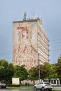 Old soviet building with a mosaic, an old communist fresco with socialist propaganda Royalty Free Stock Photo