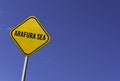 Arafura Sea - yellow sign with blue sky background Royalty Free Stock Photo