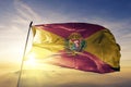 Aragua State of Venezuela flag textile cloth fabric waving on the top sunrise mist fog Royalty Free Stock Photo