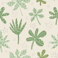 Aralia and palm leaves hand drawn seamless pattern