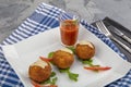 Arancini - delicious hot italian arancini. Saffron rice balls stuffed with melted cheese topped with grated parmesan cheese and