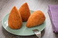 Arancini, fried rice balls, traditional Sicilian snack on a plate