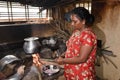 Indian woman cooking food in rural house Simple living