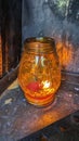 Aranzhevaya, glass lamp, candle on a dark background.