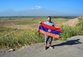 Man waving the Armenian flag