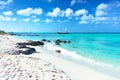 Arashi Beach Aruba Caribbean Sea sand rocks crystal clear turquoise water boats Royalty Free Stock Photo