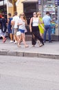 Arbat Square. Women. Traffic. Near the restaurant Prague name. Newsstand