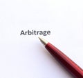 Arbitrage with pen Royalty Free Stock Photo