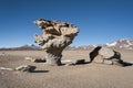 Arbol de Piedra tree of rock, the famous stone tree rock formation created by wind, in the Siloli desert Royalty Free Stock Photo
