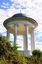 Arbor with columns in the background of a cloudy sky Royalty Free Stock Photo