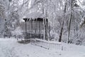 Arbor in the snowy park Royalty Free Stock Photo