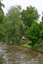 Arborist in basket boom lift taking down branches Orebro Sweden august 9 2023