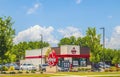 Arbys fast food Restaurant exterior building and street sign