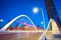 Arc bridge girder highway car light trails city night landscape Royalty Free Stock Photo