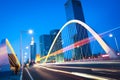 Arc bridge girder highway car light trails city night landscape Royalty Free Stock Photo