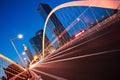 Arc bridge girder highway car light trails city night landscape