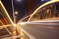 Arc bridge girder highway car light trails city night landscape Royalty Free Stock Photo