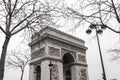 Arc de triomphe in cloudy day in winter, Paris Royalty Free Stock Photo