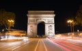 The Arc de Triomphe at Night. It is one of the most famous monuments in Paris, standing at the western end of the Champs